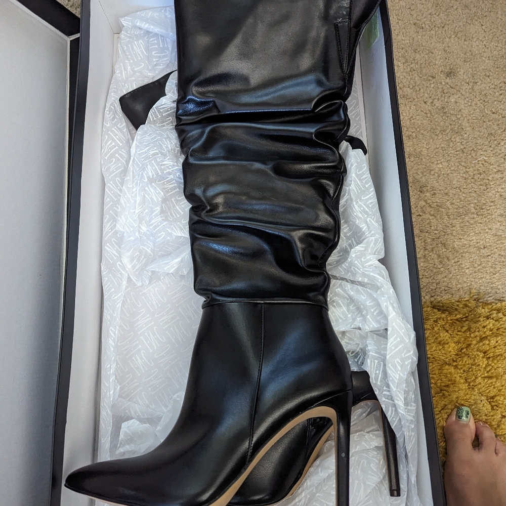 Used ounce knee high boots 8.5 inc